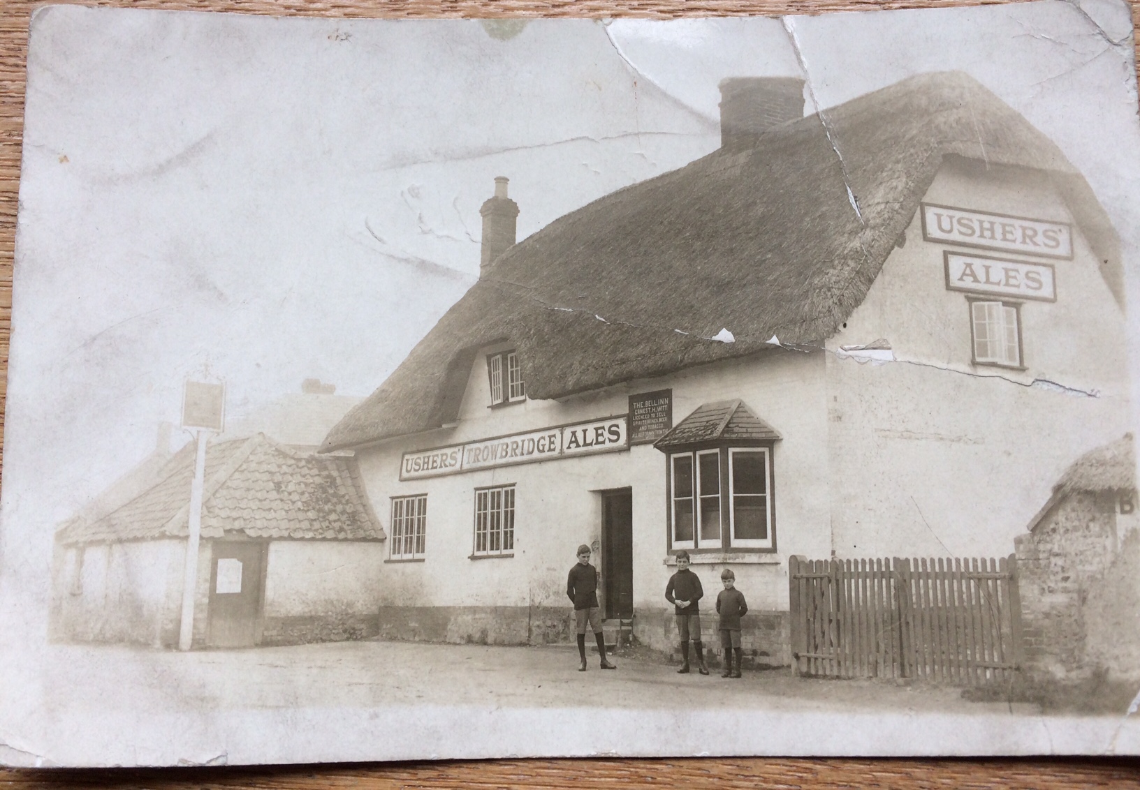 The Bell, circa 1918 - The 3 boys standing in front of the Bell are Edward, Clifford and Norman Witt, the son of Ernest Hiram Witt, the publican.